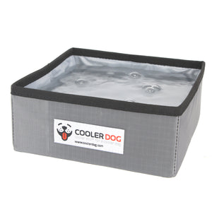 CoolerDog brand large, gray square portable dog bowl, unfolded and filled with water