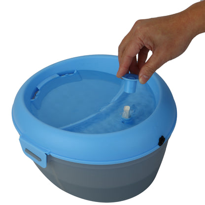 CoolerDog Healthspring pet fountain, blue/gray, , water running, with hand inserting dental stick